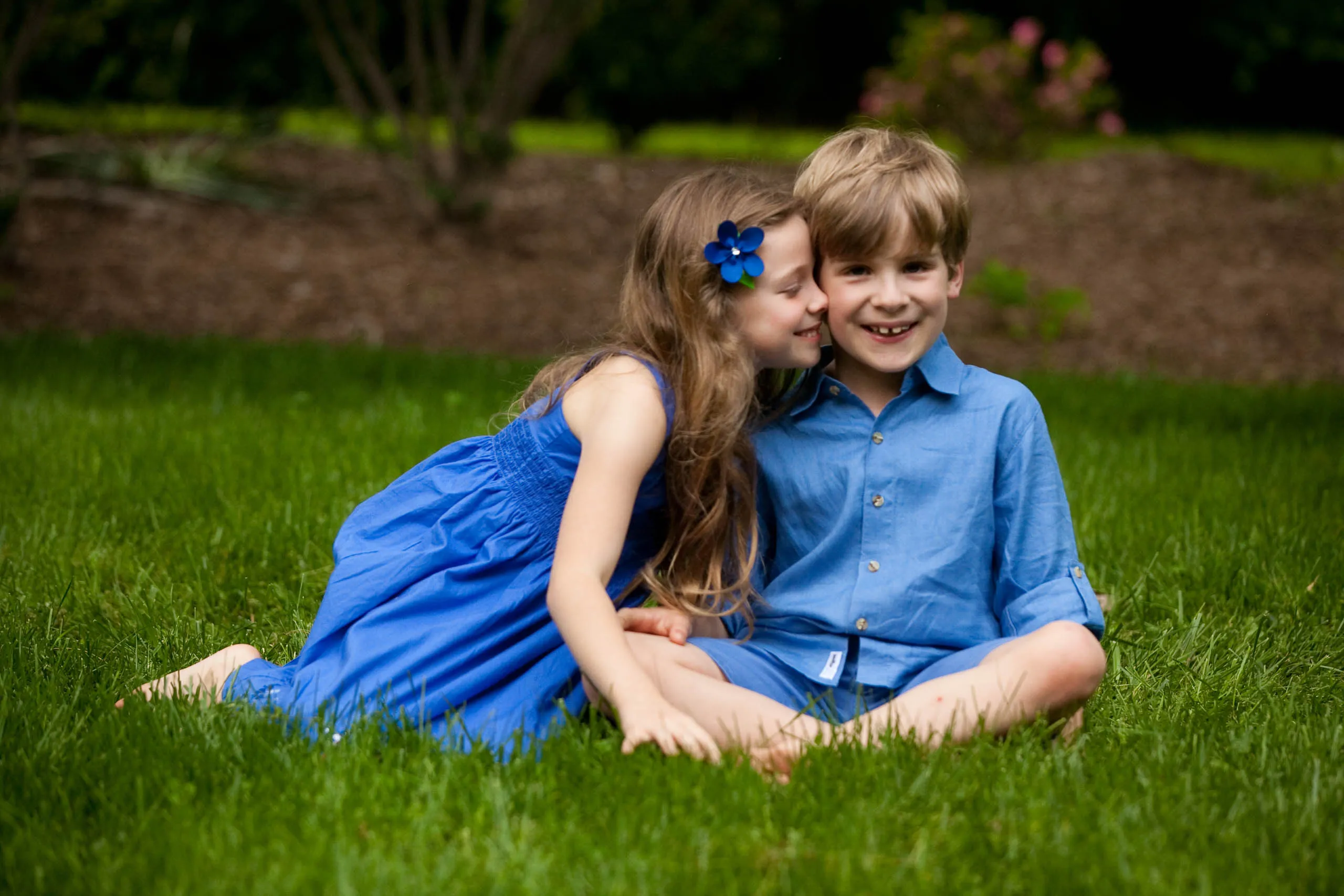 brother and sister snuggling